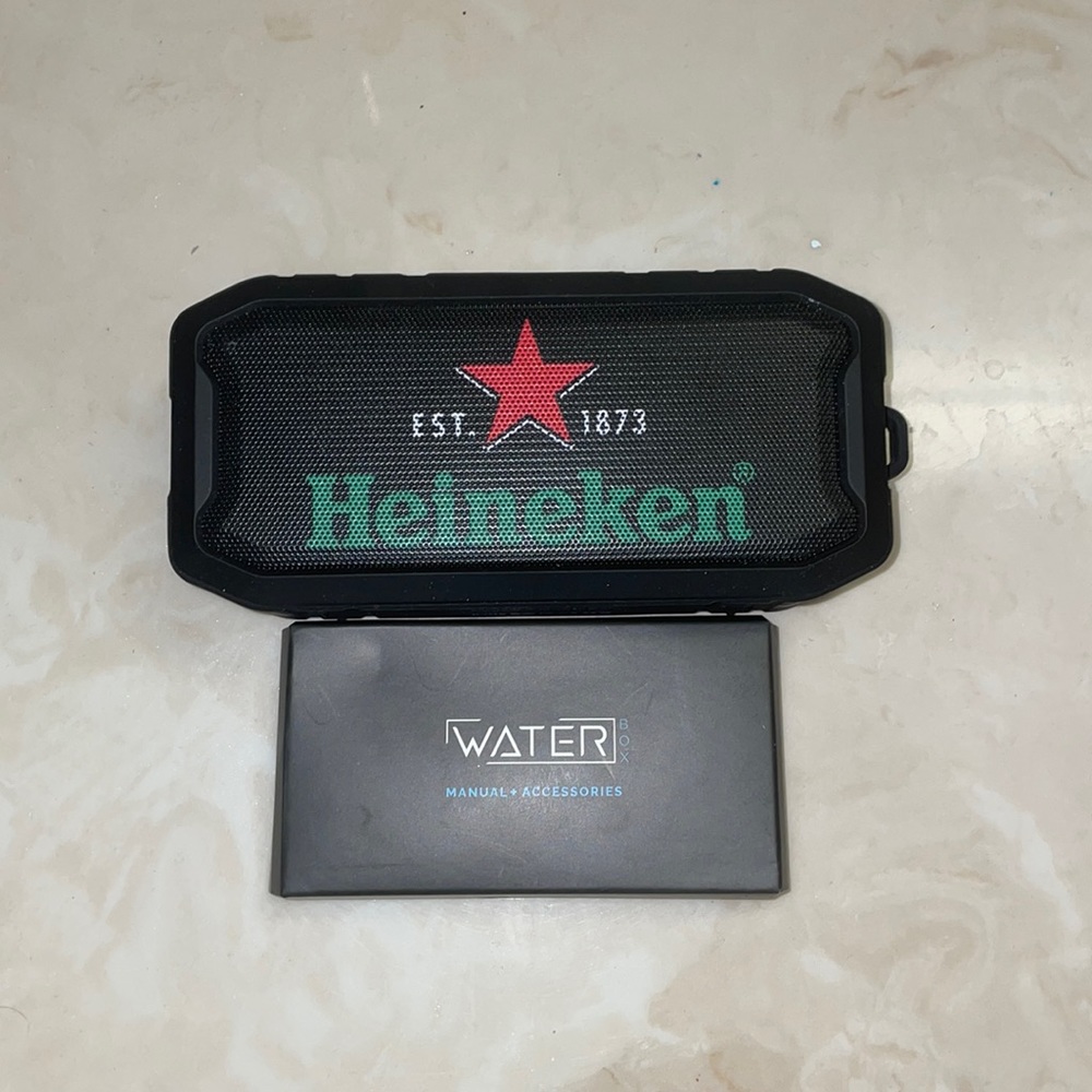 Brand new water proof Heineken speakers with 2 chargers